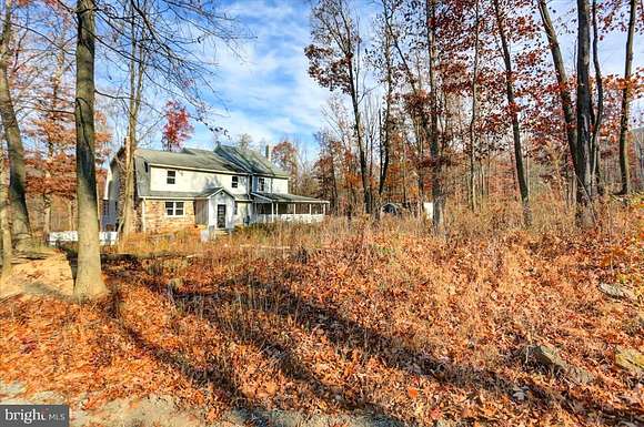 12.3 Acres of Land with Home for Sale in Spring Run, Pennsylvania