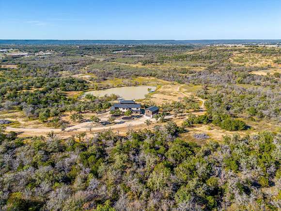 40 Acres of Agricultural Land with Home for Sale in Santo, Texas