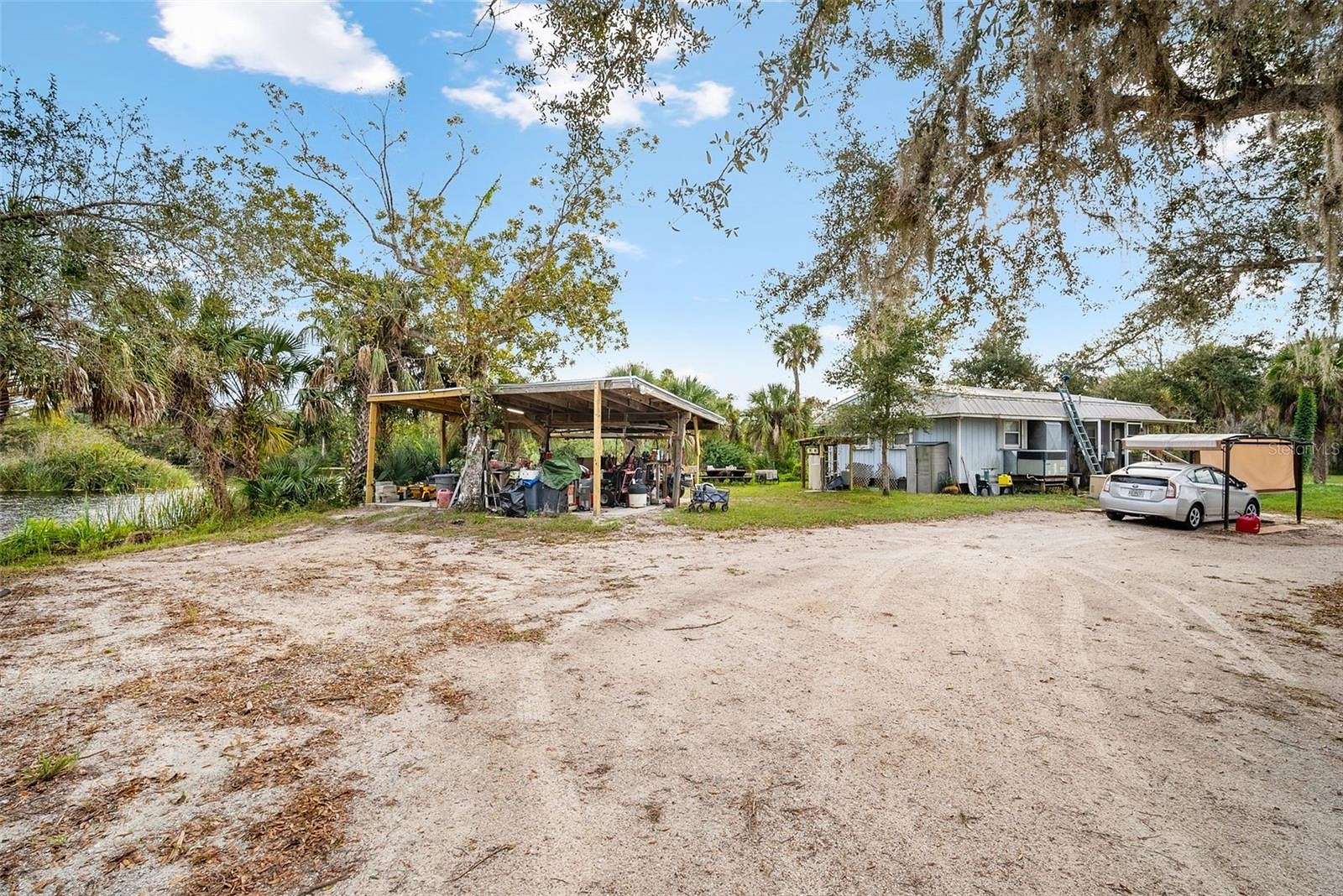 11.9 Acres of Recreational Land with Home for Sale in Punta Gorda, Florida