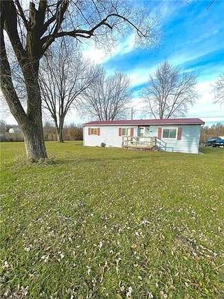 10 Acres of Residential Land with Home for Sale in Lathrop, Missouri