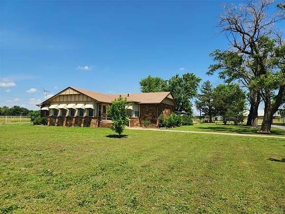 5 Acres of Residential Land with Home for Sale in Dewey, Oklahoma