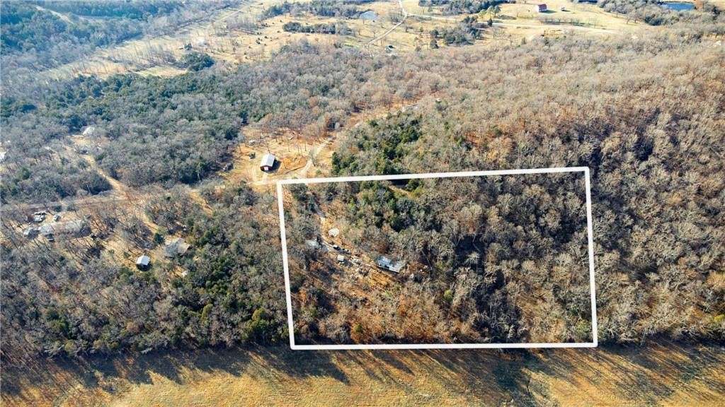 6.9 Acres of Residential Land with Home for Sale in Berryville, Arkansas