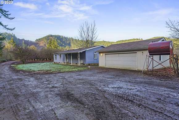95.2 Acres of Land with Home for Sale in Alsea, Oregon
