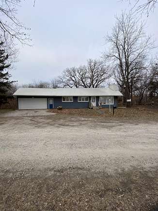 2.4 Acres of Residential Land with Home for Sale in Oelwein, Iowa