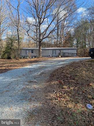 2.9 Acres of Residential Land with Home for Sale in Center Cross, Virginia