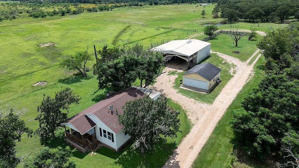 25.8 Acres of Agricultural Land with Home for Sale in Alleyton, Texas