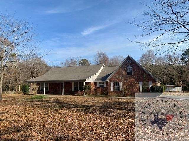 13.2 Acres of Land with Home for Sale in Atlanta, Texas