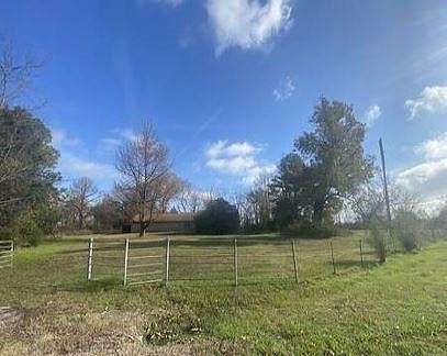 10.2 Acres of Land with Home for Sale in Avery, Texas