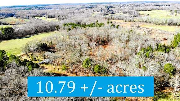 10.8 Acres of Land with Home for Sale in Siler City, North Carolina