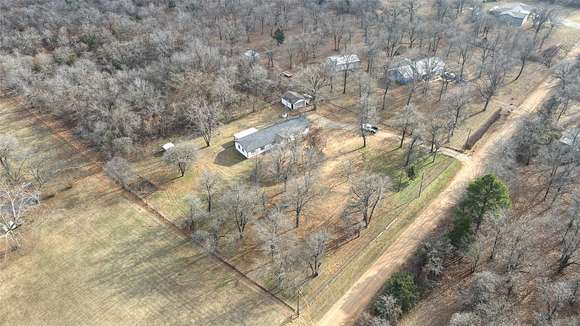 3.8 Acres of Residential Land with Home for Sale in Harrah, Oklahoma