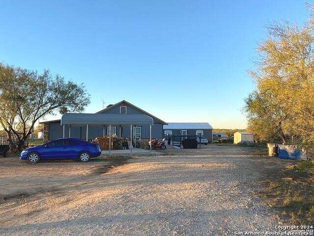 2.4 Acres of Residential Land with Home for Sale in Devine, Texas
