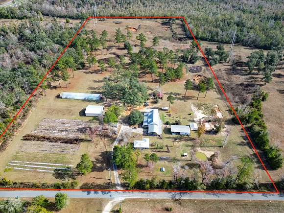 19.5 Acres of Land with Home for Sale in Marianna, Florida