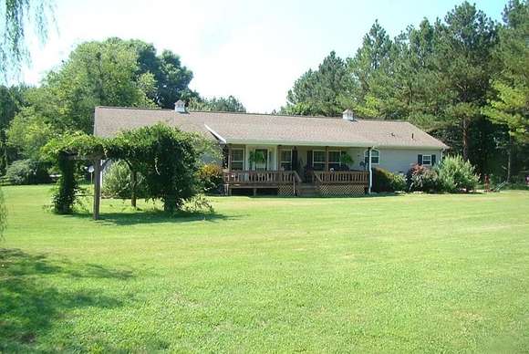 5.5 Acres of Land with Home for Sale in Paris, Tennessee