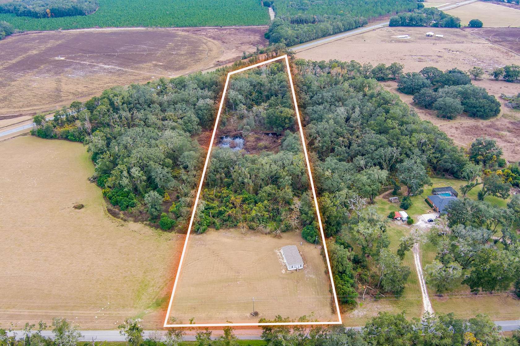 10.01 Acres of Land with Home for Sale in Mayo, Florida