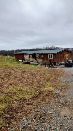 29 Acres of Land with Home for Sale in Ewing, Kentucky