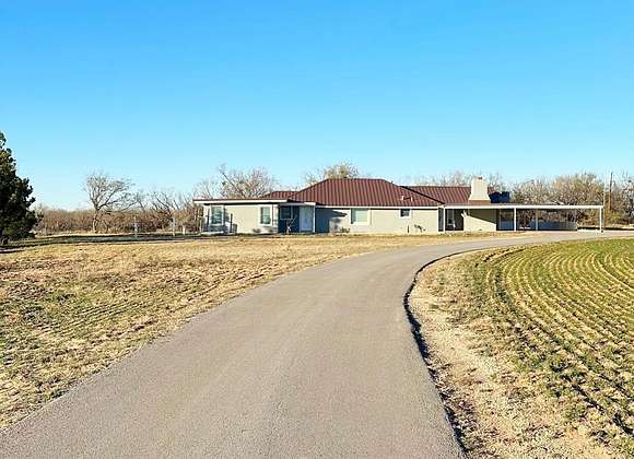 5 Acres of Residential Land with Home for Sale in Coahoma, Texas