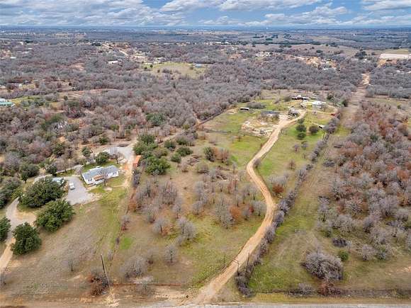 15.1 Acres of Land with Home for Sale in Springtown, Texas