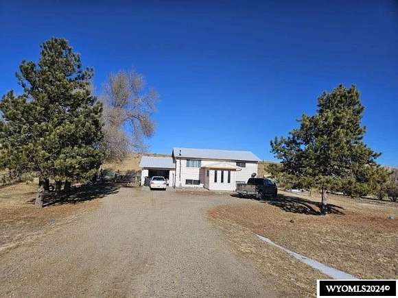 5 Acres of Land with Home for Sale in Rolling Hills, Wyoming