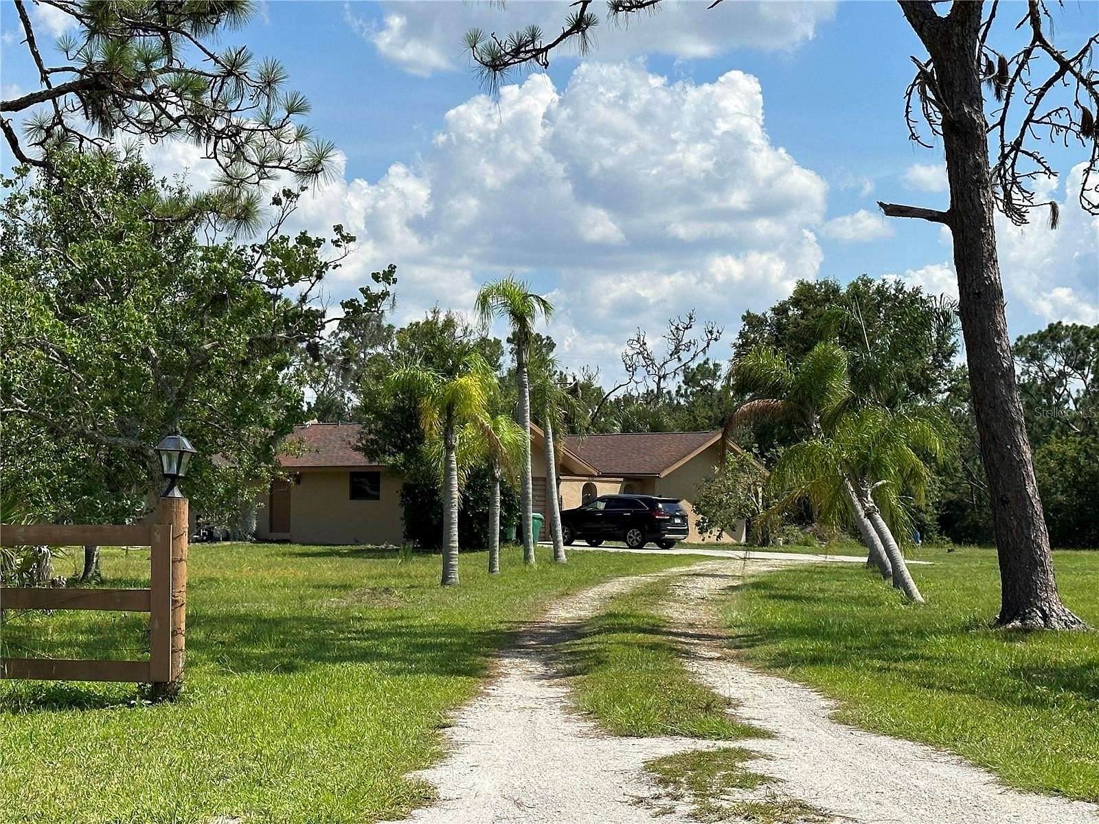 5.09 Acres of Residential Land with Home for Sale in Punta Gorda, Florida