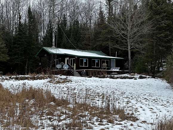 80 Acres of Recreational Land with Home for Sale in Butternut, Wisconsin