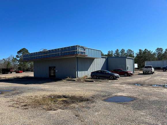4.8 Acres of Improved Commercial Land for Sale in DeRidder, Louisiana