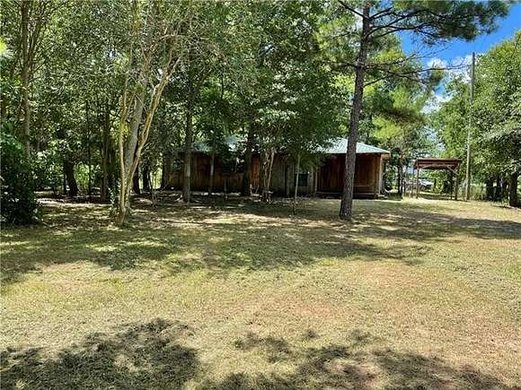 10.8 Acres of Recreational Land with Home for Sale in Alexandria, Louisiana