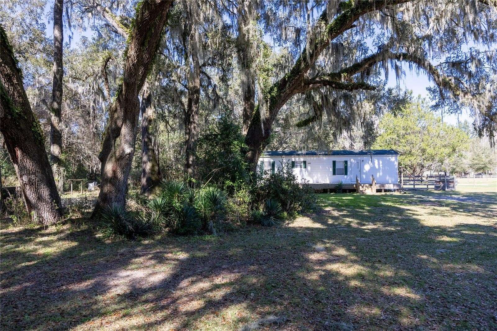 7.2 Acres of Land with Home for Sale in Newberry, Florida