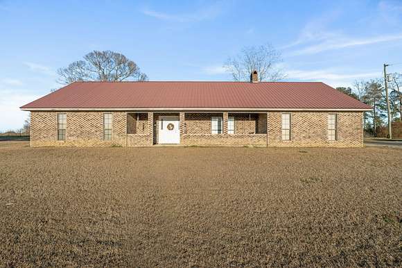5.3 Acres of Residential Land with Home for Sale in Collins, Mississippi