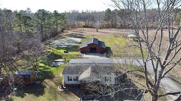 7.3 Acres of Land with Home for Sale in Blounts Creek, North Carolina