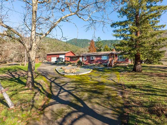 13.35 Acres of Land with Home for Sale in Grants Pass, Oregon