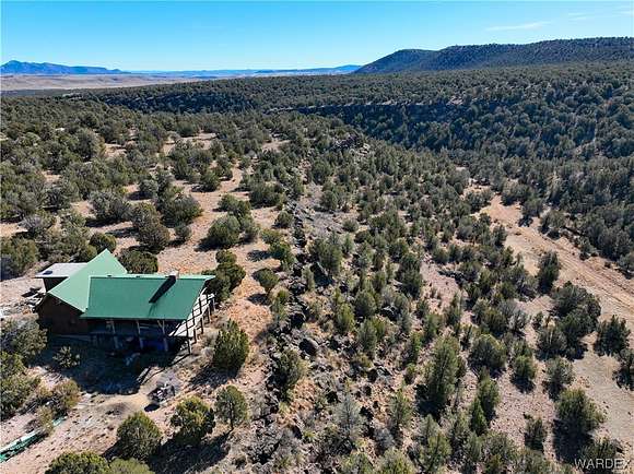 8 Acres of Residential Land with Home for Sale in Seligman, Arizona