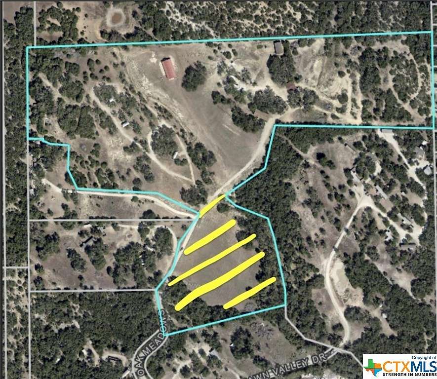 32.358 Acres of Agricultural Land with Home for Sale in Canyon Lake, Texas