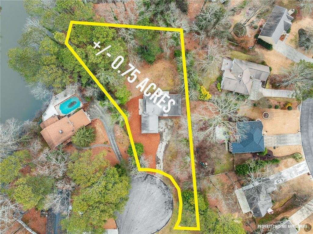 0.75 Acres of Residential Land with Home for Sale in Alpharetta, Georgia