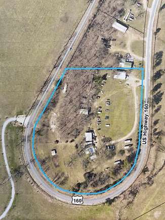 6.9 Acres of Improved Land for Sale in Walnut Shade, Missouri