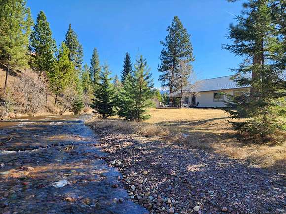 2.4 Acres of Residential Land with Home for Sale in Seeley Lake, Montana