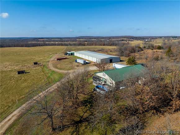 92.1 Acres of Agricultural Land with Home for Sale in Wilson Township, Missouri