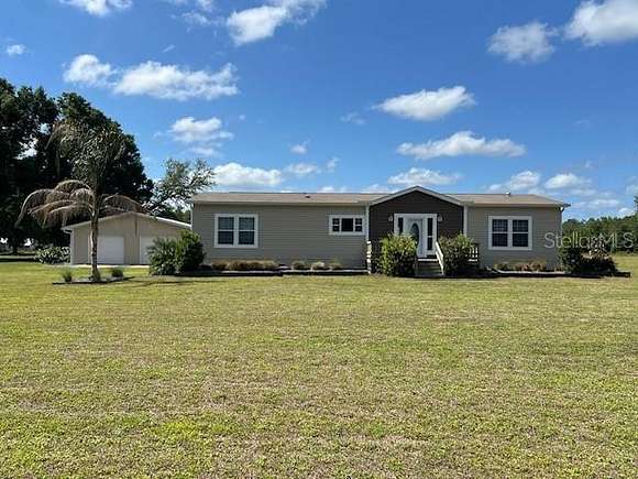 11.1 Acres of Land with Home for Sale in Webster, Florida