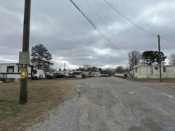 5.8 Acres of Mixed-Use Land for Sale in Laceys Spring, Alabama
