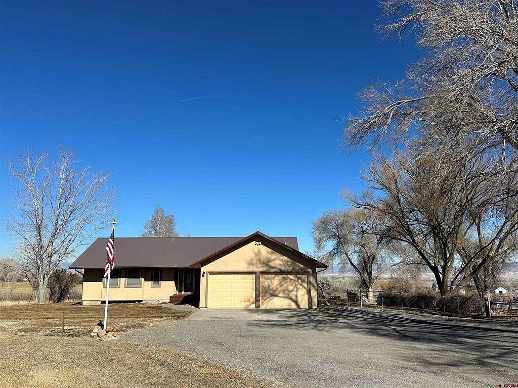 4.4 Acres of Residential Land with Home for Sale in Montrose, Colorado