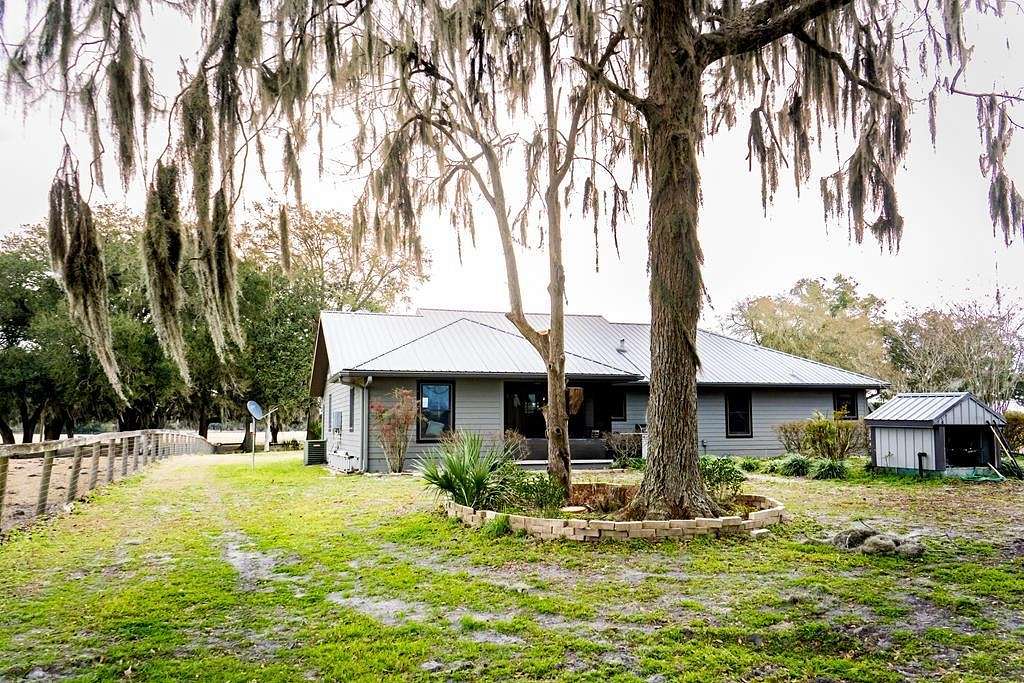 160 Acres of Agricultural Land with Home for Sale in Chiefland, Florida