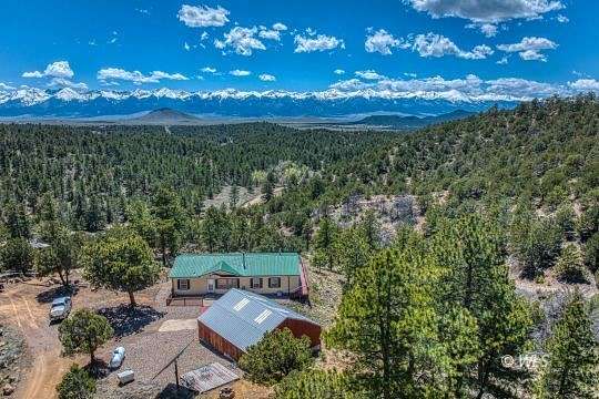 7.6 Acres of Residential Land with Home for Sale in Westcliffe, Colorado