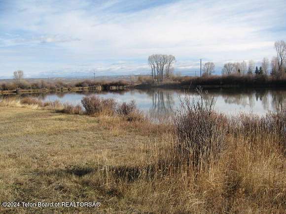 13.86 Acres of Land with Home for Sale in Daniel, Wyoming