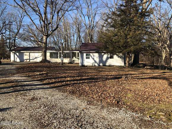 10.9 Acres of Land with Home for Sale in Oronogo, Missouri