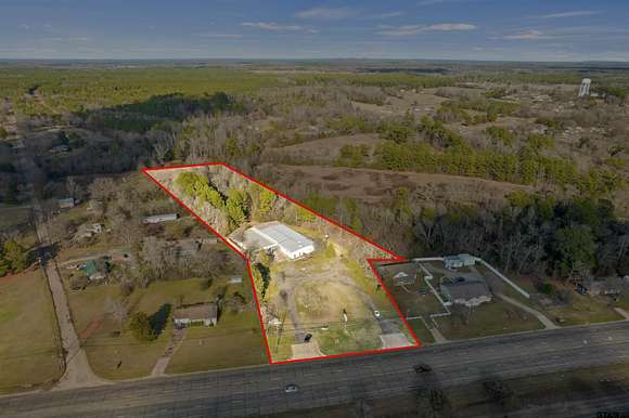 2.6 Acres of Improved Commercial Land for Sale in Hughes Springs, Texas