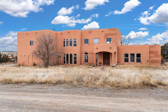 2.5 Acres of Residential Land with Home for Sale in Sandia Park, New Mexico