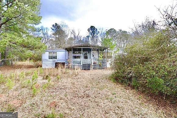 30 Acres of Land with Home for Sale in Locust Grove, Georgia