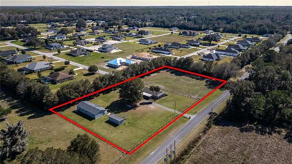 2.4 Acres of Residential Land with Home for Sale in Ocala, Florida