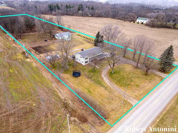 5 Acres of Land with Home for Sale in Allendale, Michigan