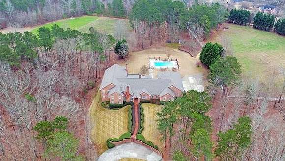 56.6 Acres of Agricultural Land with Home for Sale in Buford, Georgia