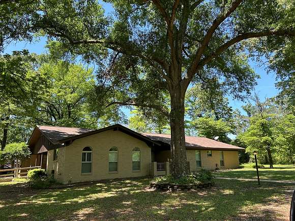 5.5 Acres of Land with Home for Sale in Atlanta, Texas